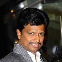 Ravi E.
