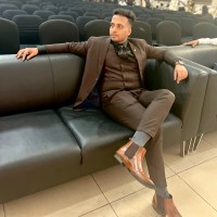 Dr Athuldhish P