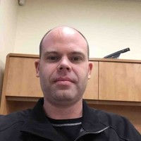 Travis Olinek