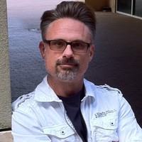 John T Mills