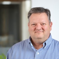 Mark E. Nicholas