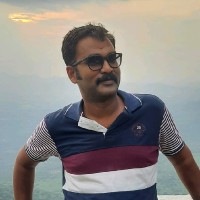 Rajavel R
