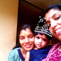 Nisha T