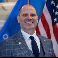 Aaron Brewer, Mpa