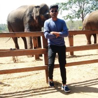 Divakar J