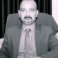 Dr. Manish Badoni