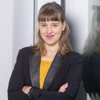 Dr. Charlotta E.
