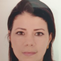 AMINA M.