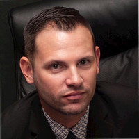 Scott T.