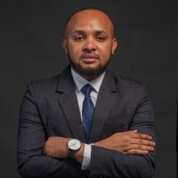 Justice E. Mangu