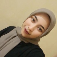 Dini M.