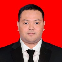 KOMANG ADI JUNIARTA