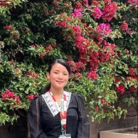 Sandhya C.