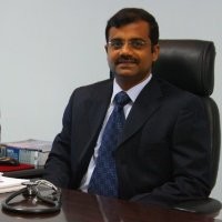 DR. G. R. RAVI