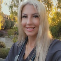 Gina E.