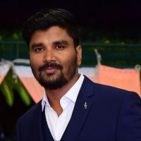 Purushothama P