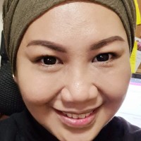 Tini Huzaini
