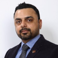 Anurag Sharma, Broker