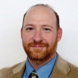 Adrian Holmes