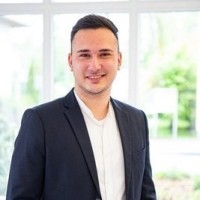 Cenk E. Boga