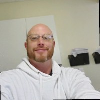 Greg Harrelson