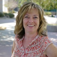 Genny L. Brezina, MC