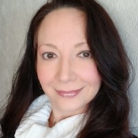 R. Eva King, Ph.D.-C, MA-ODC, MDE, BSBA