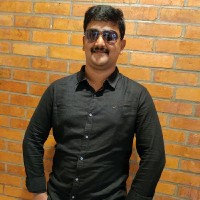 Ajay M