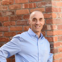 Grant Ackerly, MAI, AI-GRS, CCIM