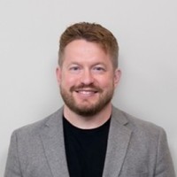 Carl Young, President PlanetCom