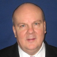 Douglas K Buss
