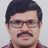 Prasad K M
