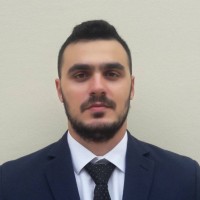Angelos Zachos, Aca