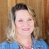 Lori Woodward, Cic, Au, Afis