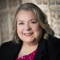 Kim Hobson, AMP