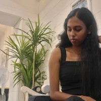 Nisha A