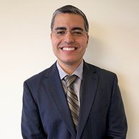Daniel E. Faltas