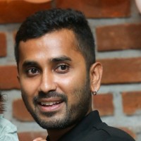 Adarsha B