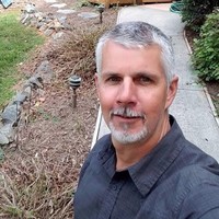 Neil K Crawford