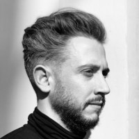 Sam E.