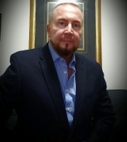 John Edward Ptasinski, Ed.D.