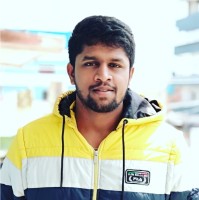 Suman M