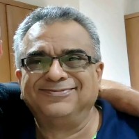 Surinder V