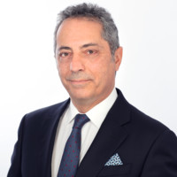 CONSTANTINE ALEXIOU   B.A., LL. B