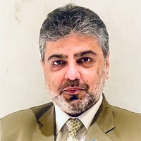 Dr Neeraj A Sharma