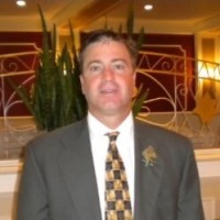 Greg V. Austin