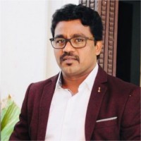 Dr Sudhakar T