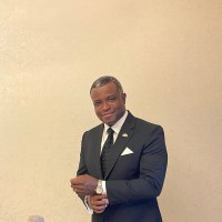 Ken E. W. Smith, MBA, DSL, TS-SCI.