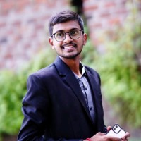 TUSHAR J.