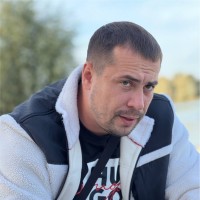 Максим Комар